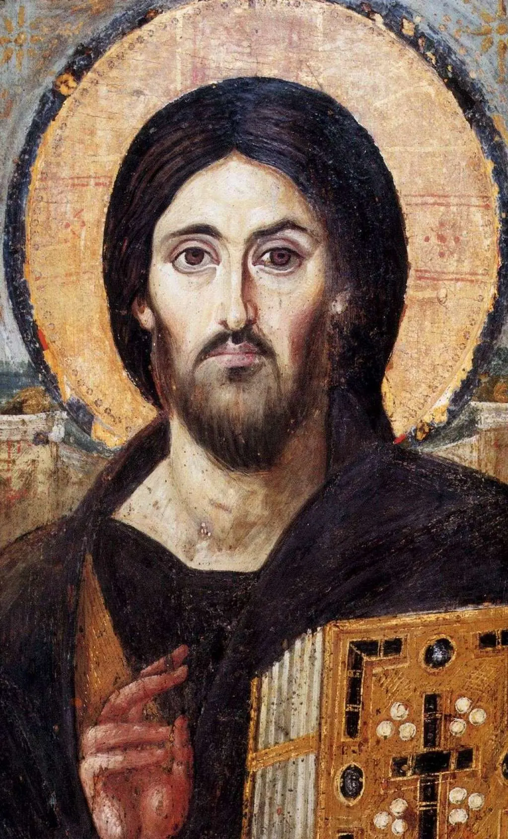 The sixth-century Sinai icon of Christ, holding a jewelled Gospel book and raising His right hand in blessing.