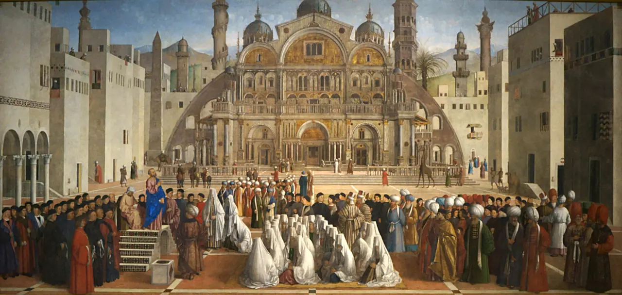 A wide Renaissance painting of St. Mark preaching from a platform in a great square, before a domed basilica and a crowd in Eastern dress.