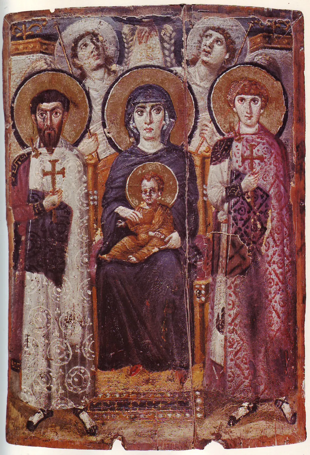 An early icon of the Virgin enthroned with the Christ child on her lap, a soldier-saint standing on either side and two angels behind.