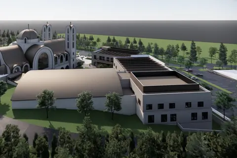 An aerial rendering close over the church roofs: the dome over the crossing and the barrel vaults either side of it.